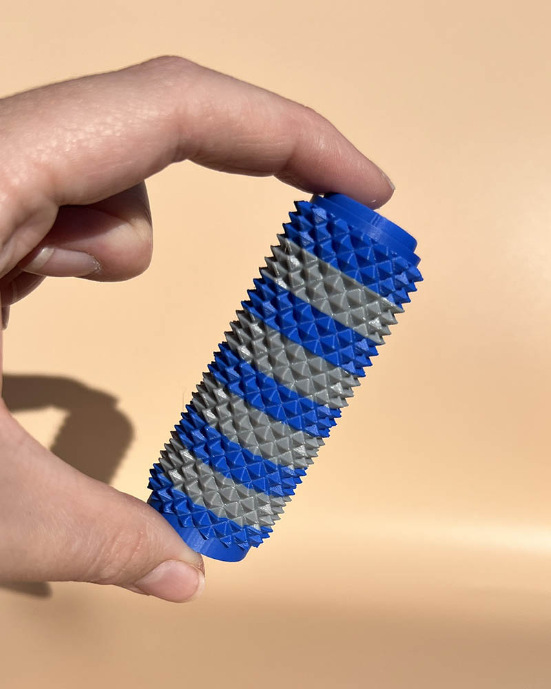 Dual Color Spiky Sensory Roller & Clicker: Firm Textured Fidget Toy