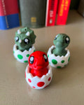 Dino in an Egg Clicker Fidget Toy