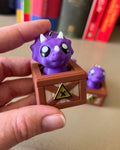 Dino in a Crate Clicker Fidget Toy