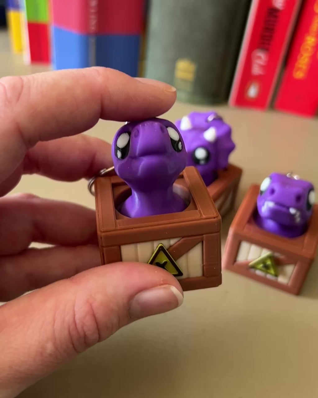 Dino in a Crate Clicker Fidget Toy