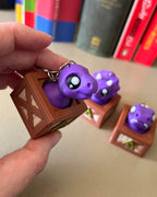 Dino in a Crate Clicker Fidget Toy